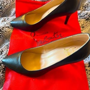 Christian Louboutin signature red bottoms!